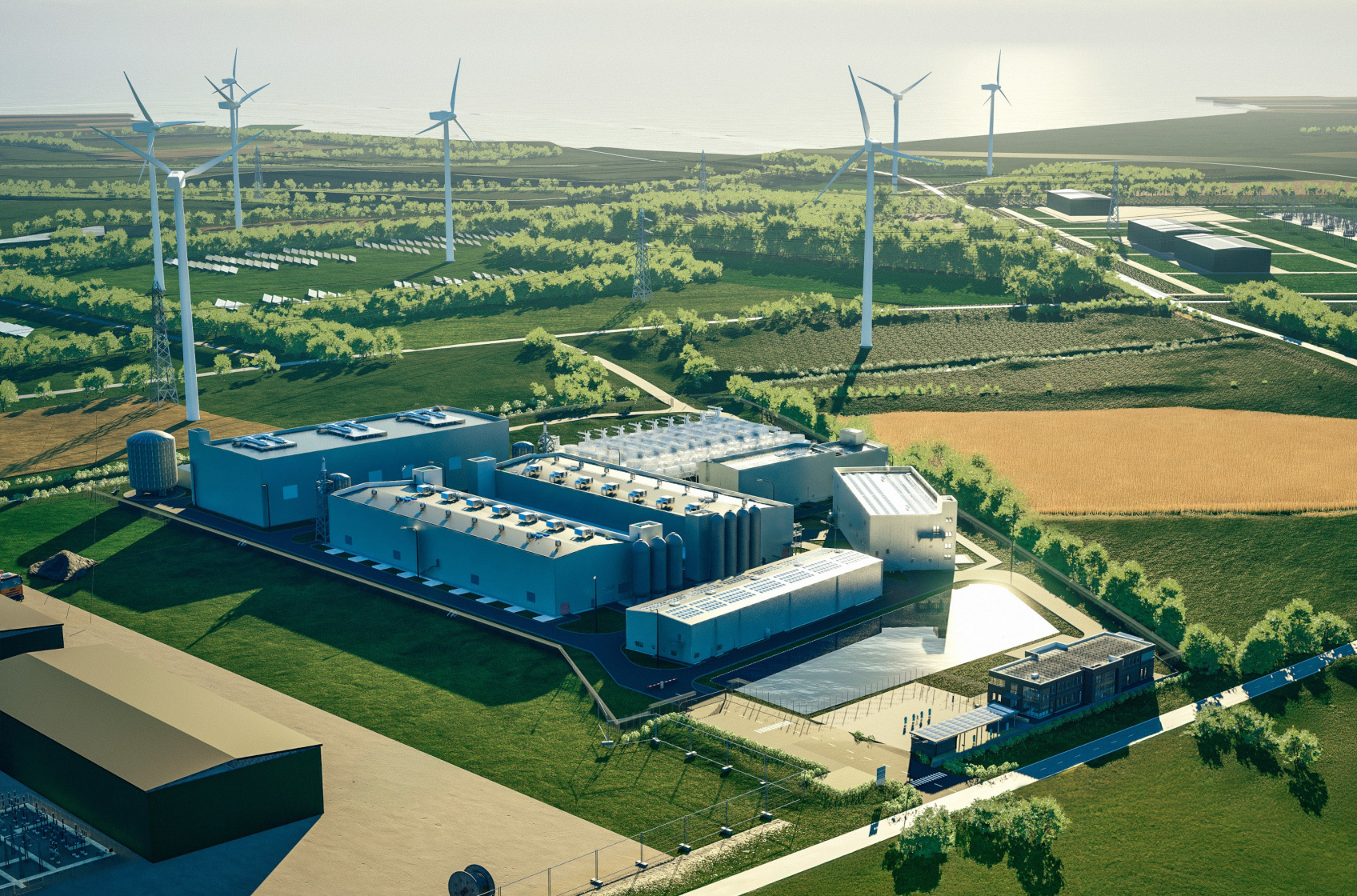 wind mills and electrlyer between green hills and fields